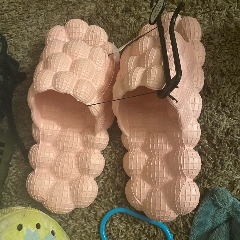 Never worn bubble slides